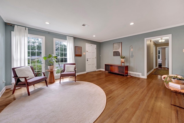 5543 Walnut Grove Rd, Memphis, TN 38120 - living area with ornamental molding, baseboards, light wood finished floors, and recessed lighting