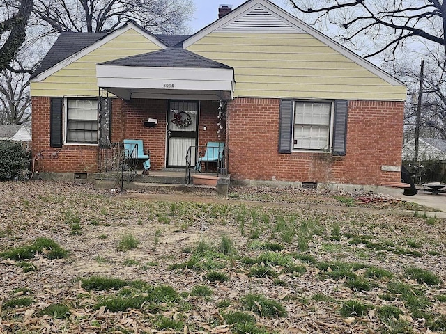 3034 Mccool Ave, Memphis, TN 38114 - view of front of home featuring brick siding and a chimney