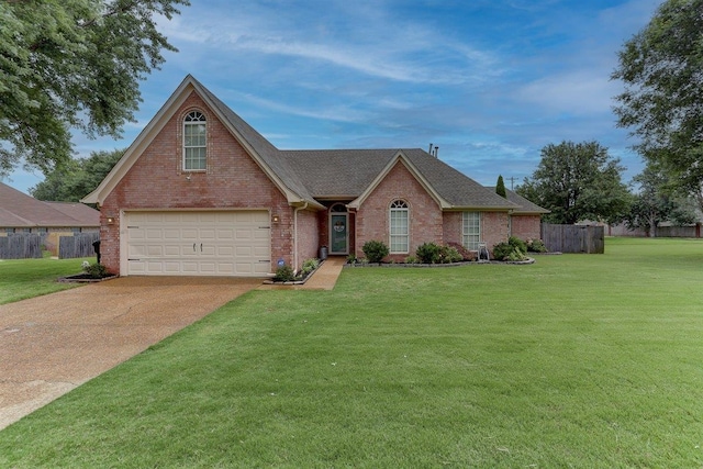4770 Shadow View Ln, Bartlett, TN 38002 - view of front of property with driveway, brick siding, a garage, and roof with shingles