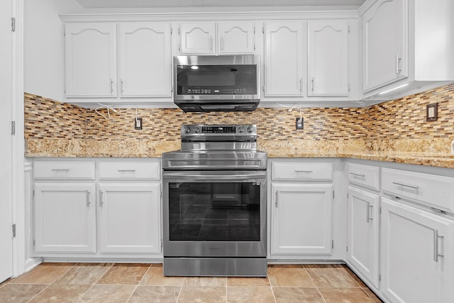 4788 Shadow View Ln, Bartlett, TN 38002 - kitchen with stainless steel appliances, white cabinetry, tasteful backsplash, and light stone counters