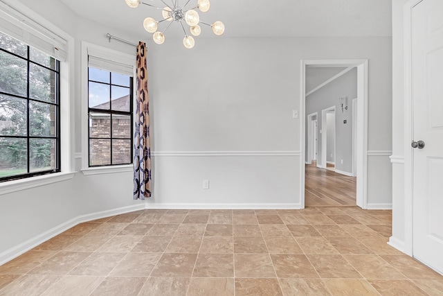4788 Shadow View Ln, Bartlett, TN 38002 - empty room with a chandelier and baseboards