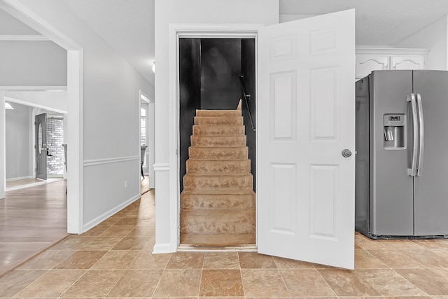 4788 Shadow View Ln, Bartlett, TN 38002 - stairway with stone finish floors and baseboards