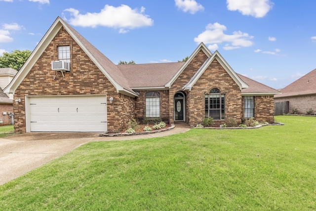 4788 Shadow View Ln, Bartlett, TN 38002 - view of front of property with brick siding, a front yard, driveway, and roof with shingles