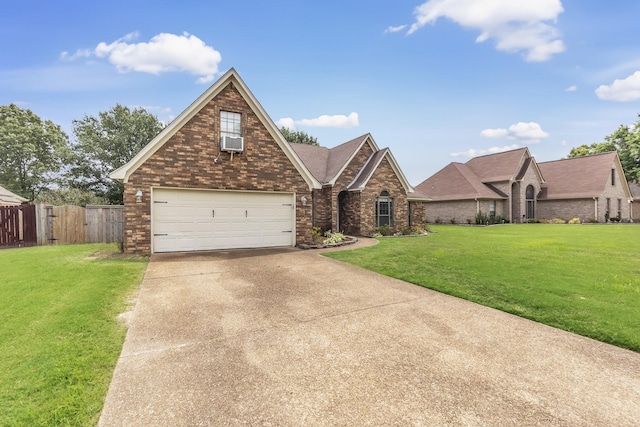 4788 Shadow View Ln, Bartlett, TN 38002 - view of front facade featuring brick siding, concrete driveway, cooling unit, an attached garage, and roof with shingles