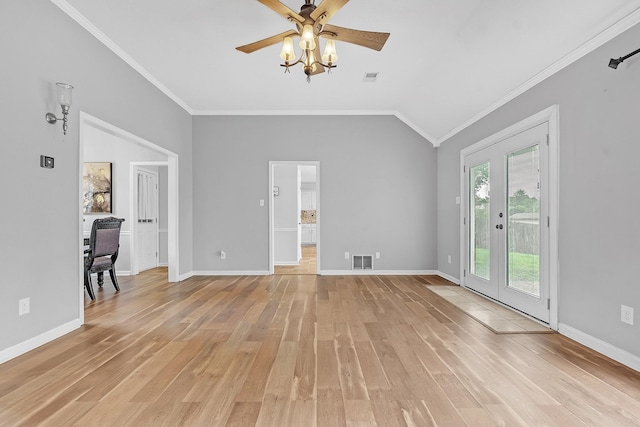 4788 Shadow View Ln, Bartlett, TN 38002 - unfurnished living room featuring light wood-style floors, ornamental molding, a ceiling fan, baseboards, and lofted ceiling