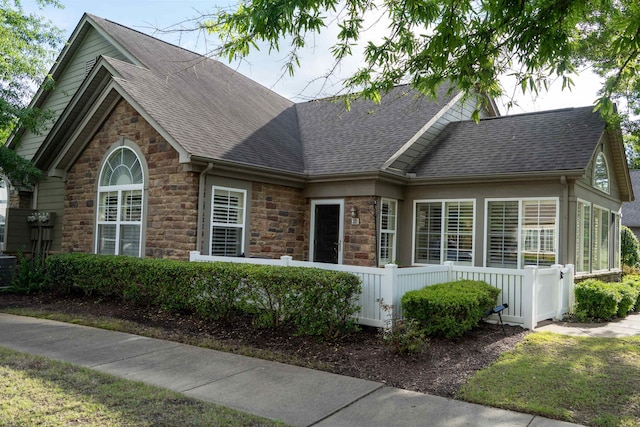 301 Stonevillage Dr W Unit 51, Collierville, TN 38017 - view of front facade with stone siding and roof with shingles