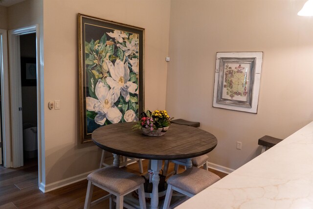 301 Stonevillage Dr W Unit 51, Collierville, TN 38017 - dining area with dark wood-type flooring and baseboards
