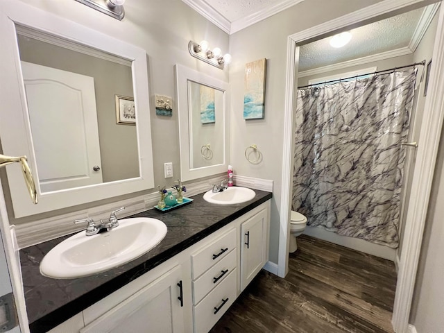 2045 Hardin Graveyard Rd, Adamsville, TN 38310 - bathroom with toilet, wood finished floors, double vanity, a shower with shower curtain, and ornamental molding