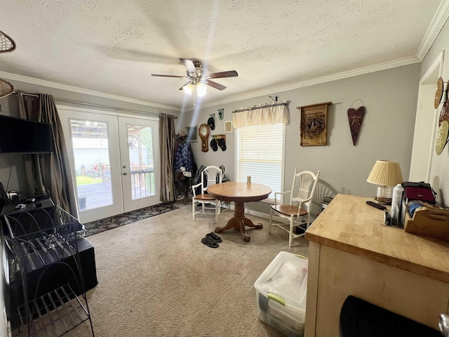 2045 Hardin Graveyard Rd, Adamsville, TN 38310 - carpeted dining area with french doors, healthy amount of natural light, ornamental molding, ceiling fan, and a textured ceiling