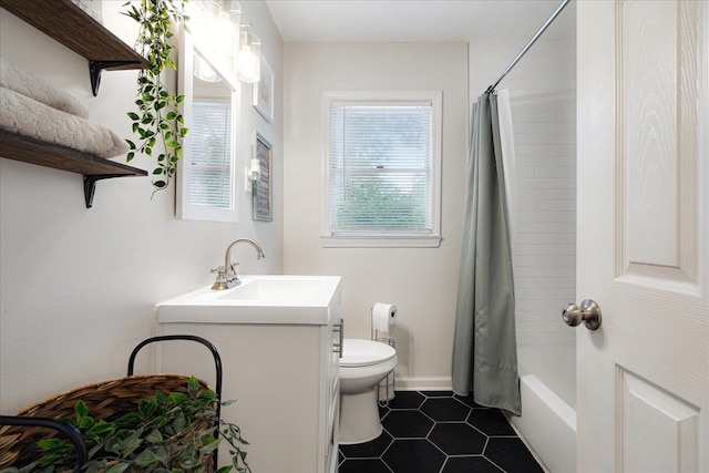 1159 Echles St, Memphis, TN 38111 - bathroom with vanity, tile patterned flooring, toilet, and shower / tub combo with curtain