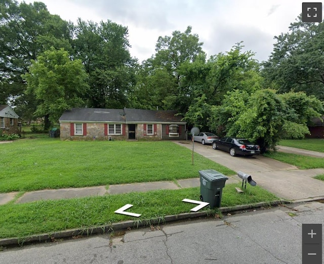 1393 Greendale Ave, Memphis, TN 38127 - ranch-style home featuring driveway and a front lawn