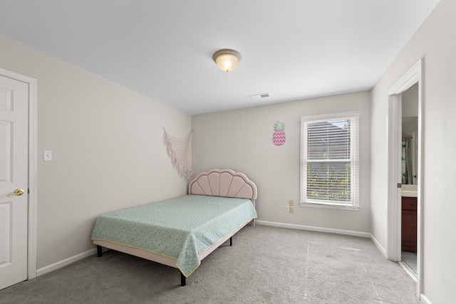 420 Estanaula Rd, Collierville, TN 38017 - carpeted bedroom featuring baseboards and ensuite bath