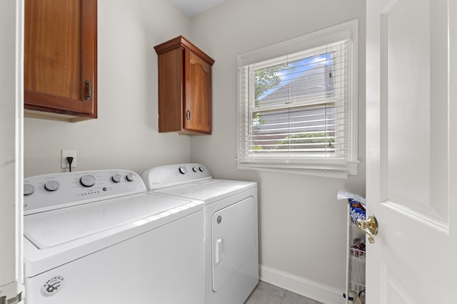 420 Estanaula Rd, Collierville, TN 38017 - laundry area with independent washer and dryer, cabinet space, light tile patterned floors, and baseboards