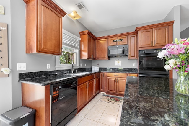 420 Estanaula Rd, Collierville, TN 38017 - kitchen with black appliances, a sink, light tile patterned floors, dark stone countertops, and brown cabinetry