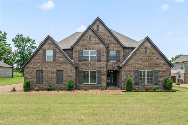 6159 Upper Granger St, Arlington, TN 38002 - view of front of house with brick siding and a front lawn