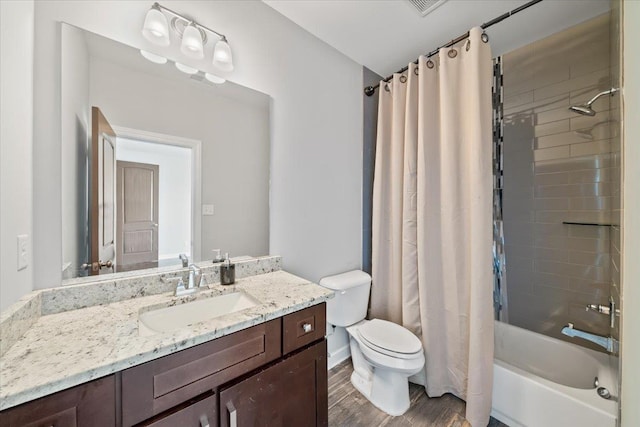 6159 Upper Granger St, Arlington, TN 38002 - full bath with toilet, vanity, shower / bathtub combination with curtain, and wood finished floors