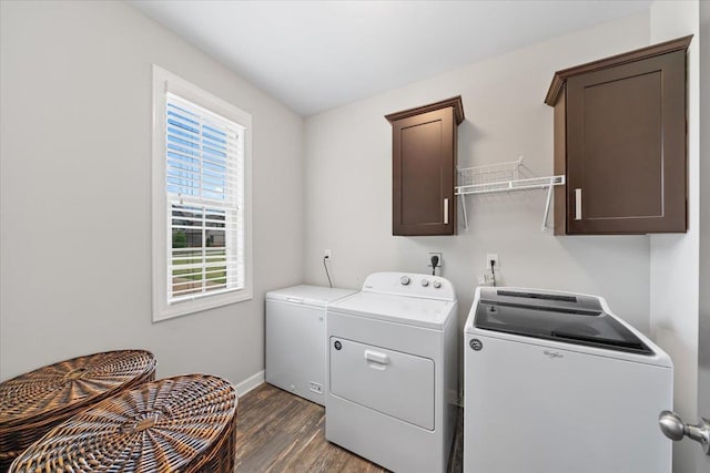 6159 Upper Granger St, Arlington, TN 38002 - washroom with cabinet space, independent washer and dryer, wood finished floors, and baseboards