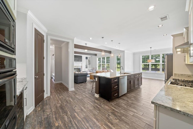 6159 Upper Granger St, Arlington, TN 38002 - kitchen featuring a sink, appliances with stainless steel finishes, baseboards, dark wood-type flooring, and ornamental molding
