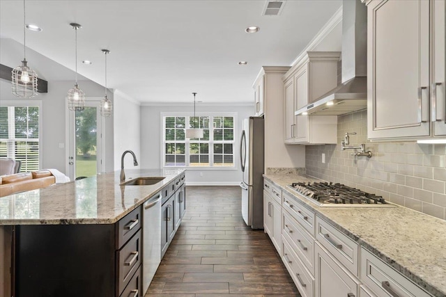 6159 Upper Granger St, Arlington, TN 38002 - kitchen with wall chimney range hood, stainless steel appliances, a sink, dark wood finished floors, and healthy amount of natural light