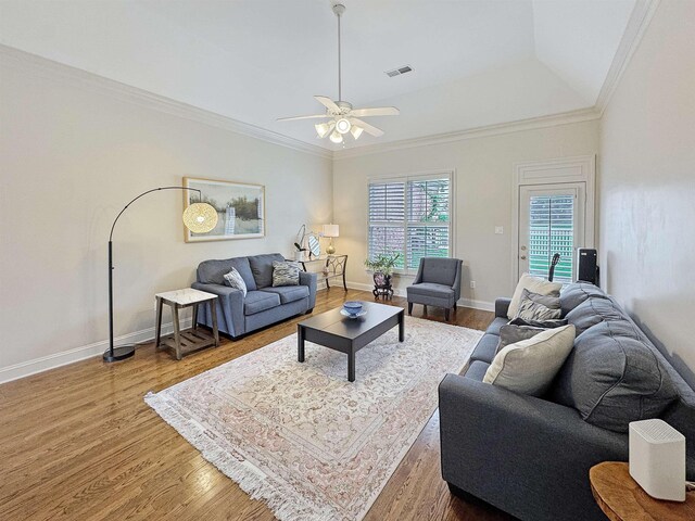 8905 River Pine Dr, Cordova, TN 38016 - living room with wood finished floors, ceiling fan, ornamental molding, and baseboards