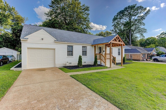 4009 Hemingway Ave, Memphis, TN 38128 - view of front facade with crawl space, roof with shingles, a garage, brick siding, and a front yard