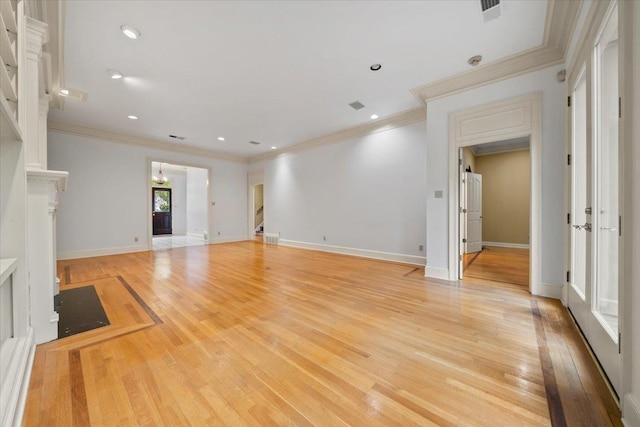 1061 Humphrey Oaks Cir, Memphis, TN 38120 - unfurnished living room featuring light wood finished floors, ornamental molding, and recessed lighting