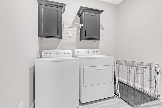 7415 Lost Grove Ln, Cordova, TN 38016 - laundry room with washer and dryer and cabinet space