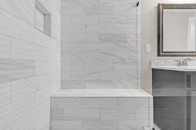 7415 Lost Grove Ln, Cordova, TN 38016 - bathroom featuring vanity and tiled shower