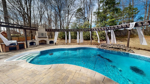 4111 Sir Thopas Dr, Southaven, MS 38671 - view of pool with exterior fireplace, a patio, and grilling area
