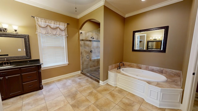 4111 Sir Thopas Dr, Southaven, MS 38671 - bathroom featuring a bath, a shower stall, vanity, ornamental molding, and tile patterned flooring