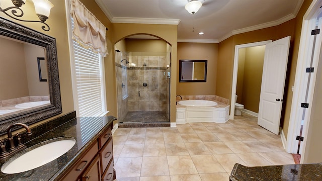 4111 Sir Thopas Dr, Southaven, MS 38671 - bathroom with a garden tub, a stall shower, vanity, tile patterned flooring, and ornamental molding