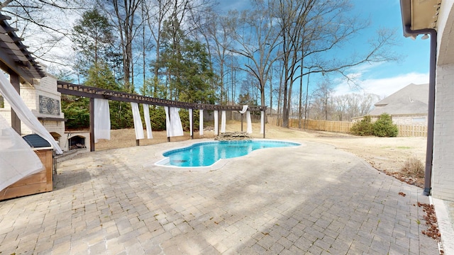 4111 Sir Thopas Dr, Southaven, MS 38671 - view of swimming pool featuring exterior fireplace, a pergola, and a patio
