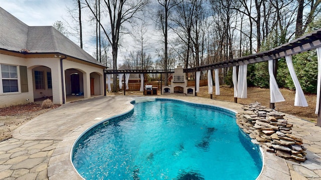4111 Sir Thopas Dr, Southaven, MS 38671 - outdoor pool with an outdoor fireplace and a patio