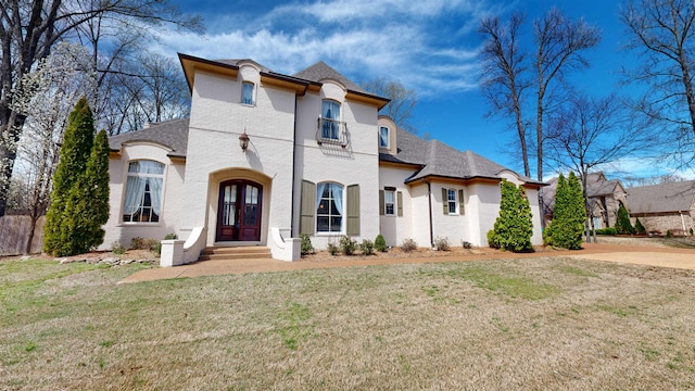 4111 Sir Thopas Dr, Southaven, MS 38671 - french country inspired facade featuring a front lawn, brick siding, and a shingled roof