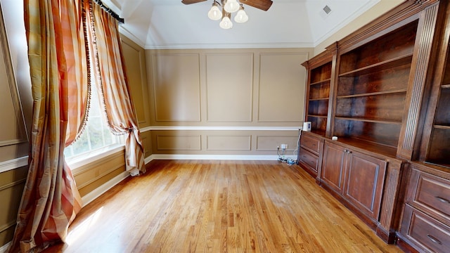 4111 Sir Thopas Dr, Southaven, MS 38671 - unfurnished room with a decorative wall, a ceiling fan, and light wood-style flooring