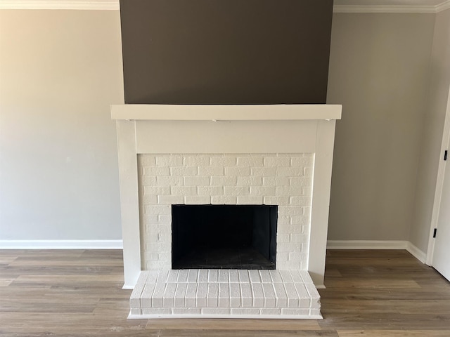 3179 Flowering Cherry Ln Unit 3179, Memphis, TN 38115 - detailed view of crown molding, wood finished floors, and a fireplace with raised hearth
