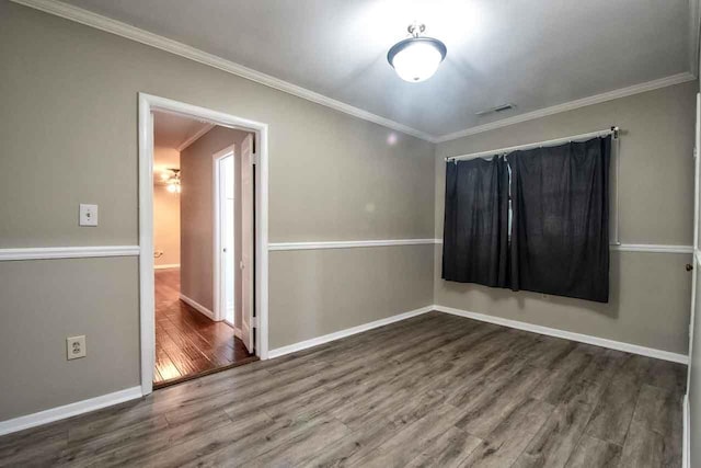 4737 Sequoia Ave, Memphis, TN 38117 - unfurnished room with wood finished floors and crown molding
