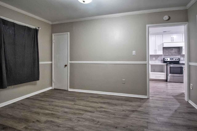 4737 Sequoia Ave, Memphis, TN 38117 - spare room featuring wood finished floors, crown molding, and a smoke detector