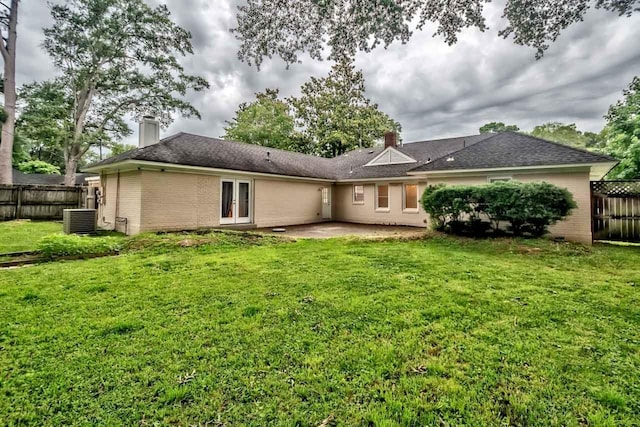 4737 Sequoia Ave, Memphis, TN 38117 - rear view of house with a chimney, brick siding, a patio, and french doors