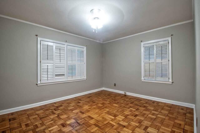 4737 Sequoia Ave, Memphis, TN 38117 - empty room featuring baseboards and crown molding