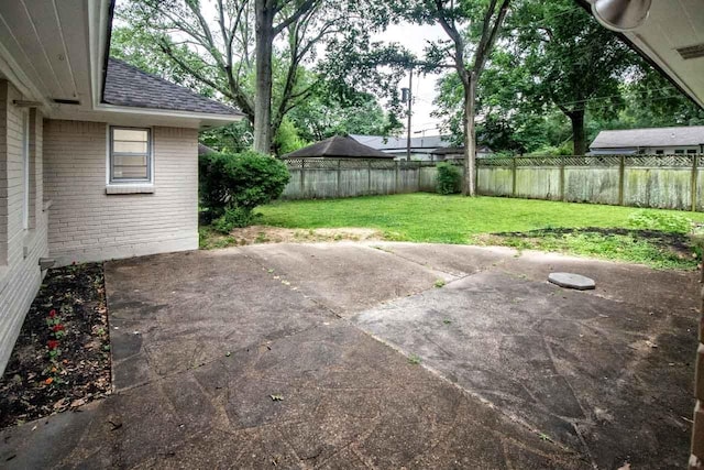 4737 Sequoia Ave, Memphis, TN 38117 - fenced backyard featuring a patio area