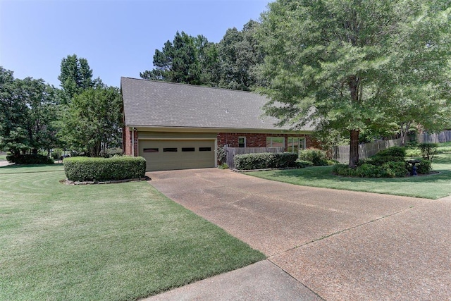 2994 Oakleigh Ln, Germantown, TN 38138 - view of front of home with a garage, concrete driveway, brick siding, and roof with shingles