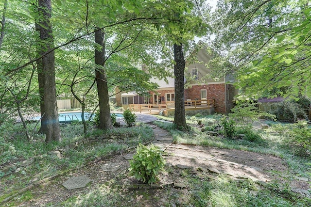 2994 Oakleigh Ln, Germantown, TN 38138 - view of yard featuring a deck and an outdoor pool