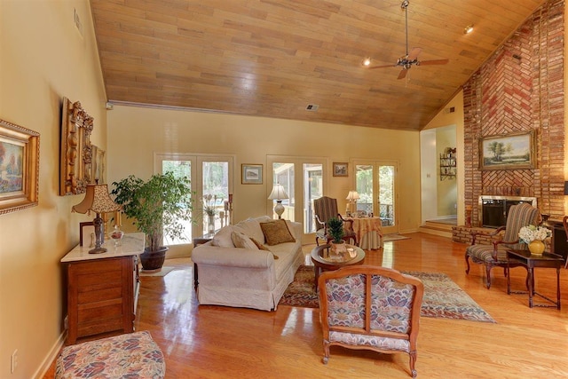 2994 Oakleigh Ln, Germantown, TN 38138 - living room featuring high vaulted ceiling, wood ceiling, ceiling fan, wood finished floors, and a fireplace