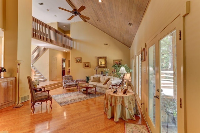2994 Oakleigh Ln, Germantown, TN 38138 - living room featuring high vaulted ceiling, light wood-type flooring, ceiling fan, stairway, and recessed lighting