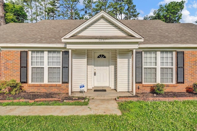 3051 Overbrook Dr, Memphis, TN 38128 - view of front of home featuring brick siding and roof with shingles