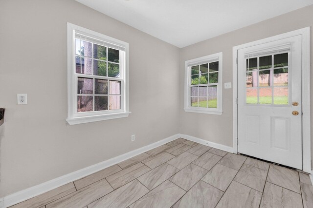 3051 Overbrook Dr, Memphis, TN 38128 - doorway to outside featuring baseboards