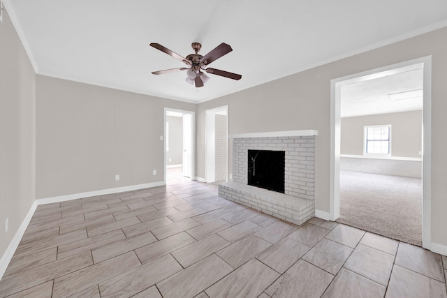 3051 Overbrook Dr, Memphis, TN 38128 - unfurnished living room featuring ceiling fan, crown molding, and a brick fireplace