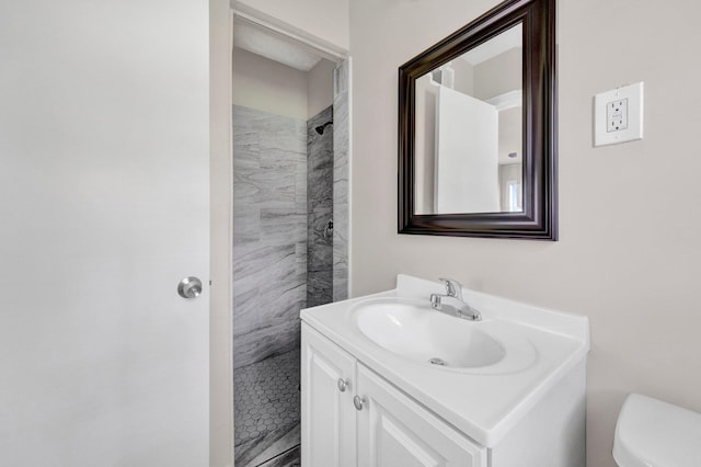 3051 Overbrook Dr, Memphis, TN 38128 - bathroom featuring a tile shower and vanity