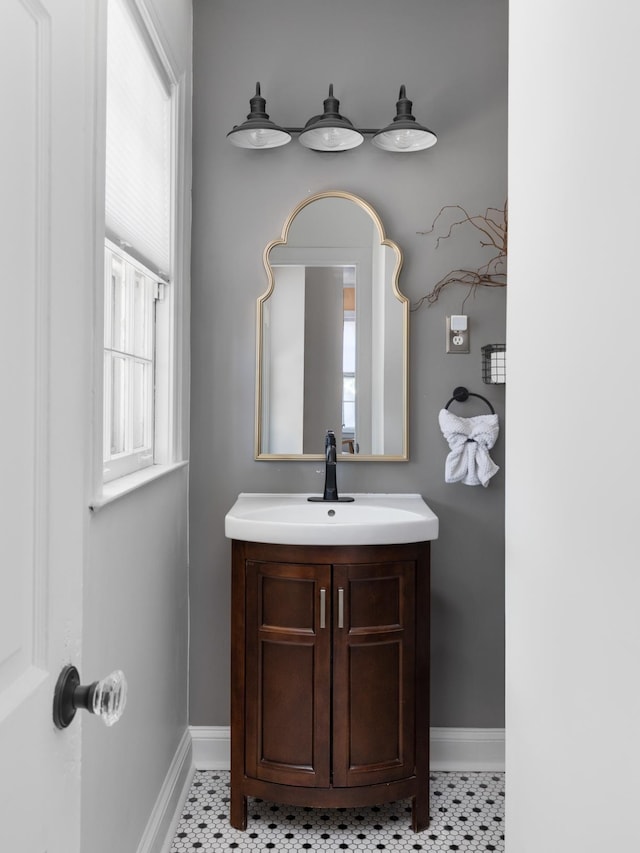 1856 N Rainbow Dr, Memphis, TN 38107 - bathroom featuring vanity and healthy amount of natural light